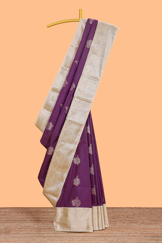 Purple zari butta design semi soft silk saree with contrast border and pallu