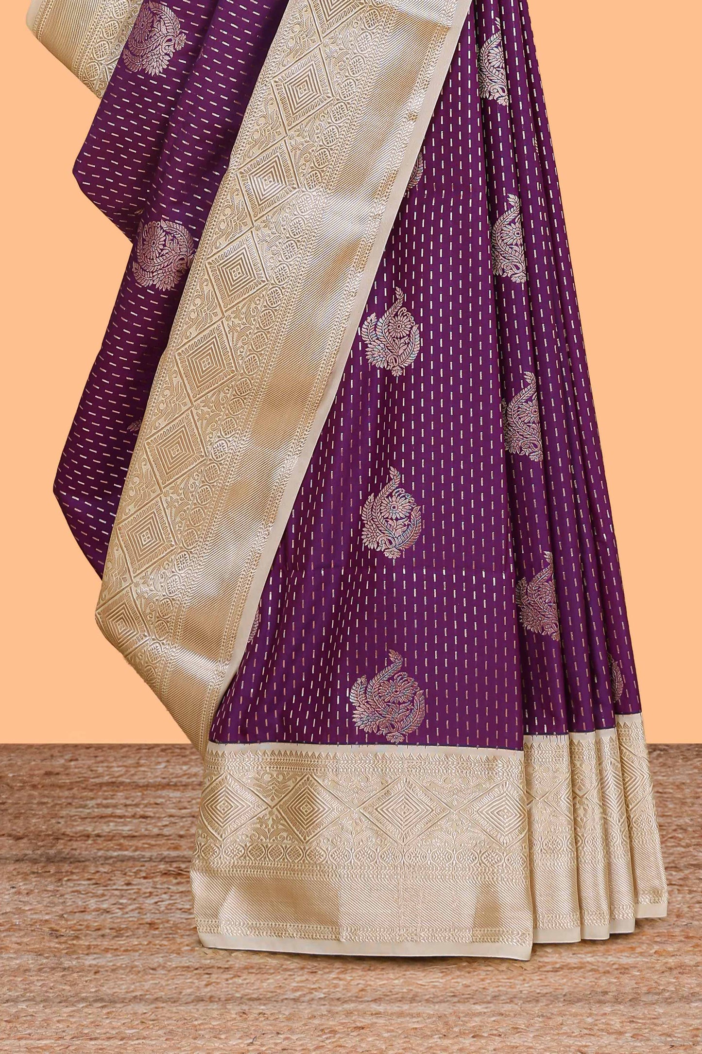 Purple zari butta design semi soft silk saree with contrast border and pallu