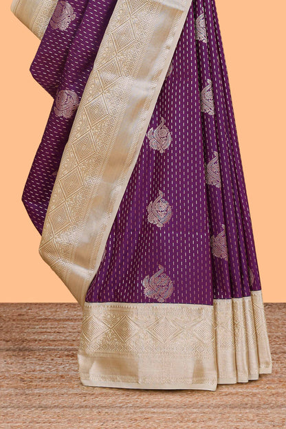 Purple zari butta design semi soft silk saree with contrast border and pallu