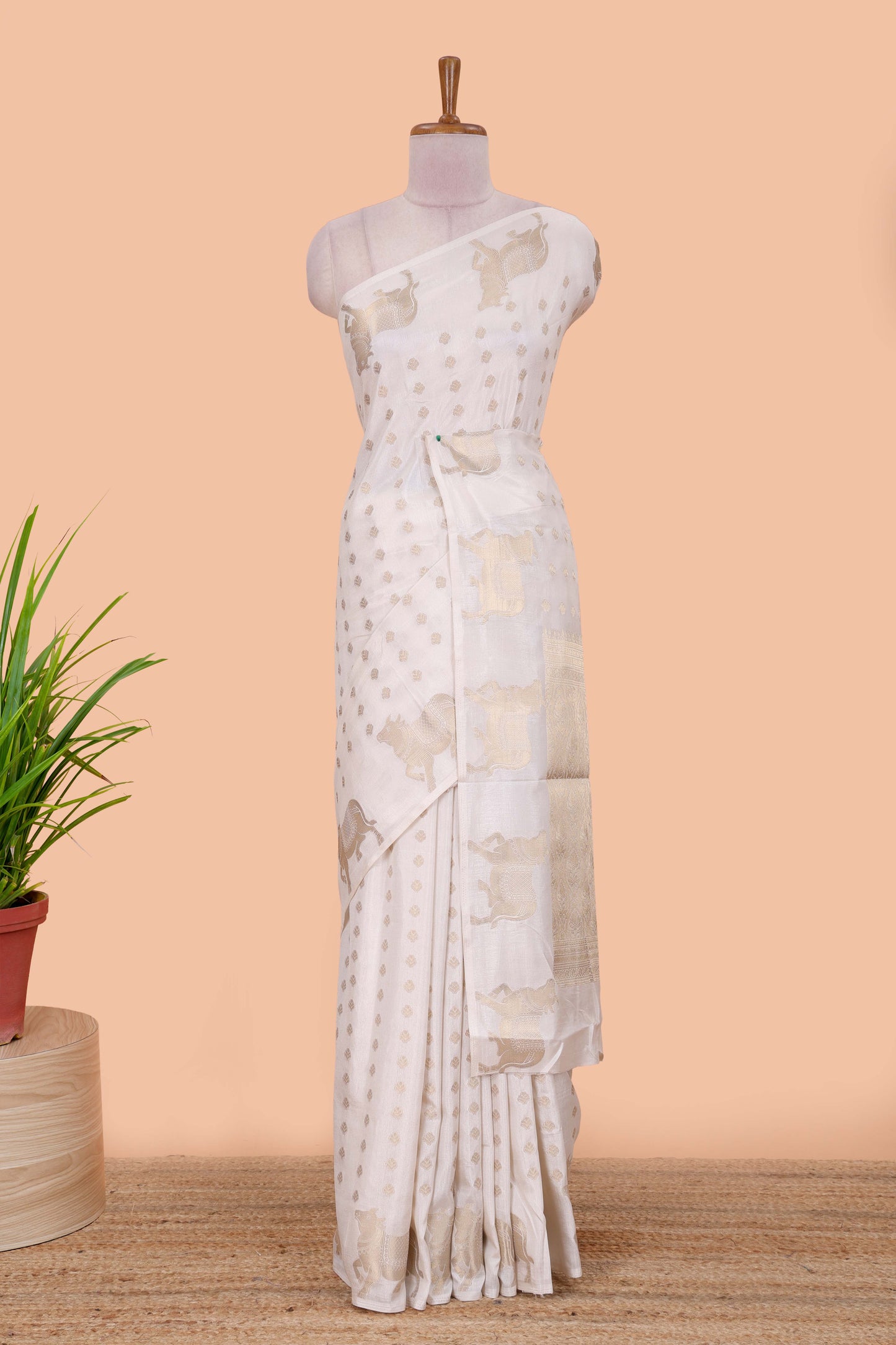 White viscose dola silk saree with zari butta weave, pichwai motif border and contrast blouse