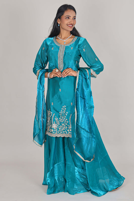 Turquiose green floral butta stone work embroidered sharara set with 3/4 sleeves, U-neck matching bottom and dupatta