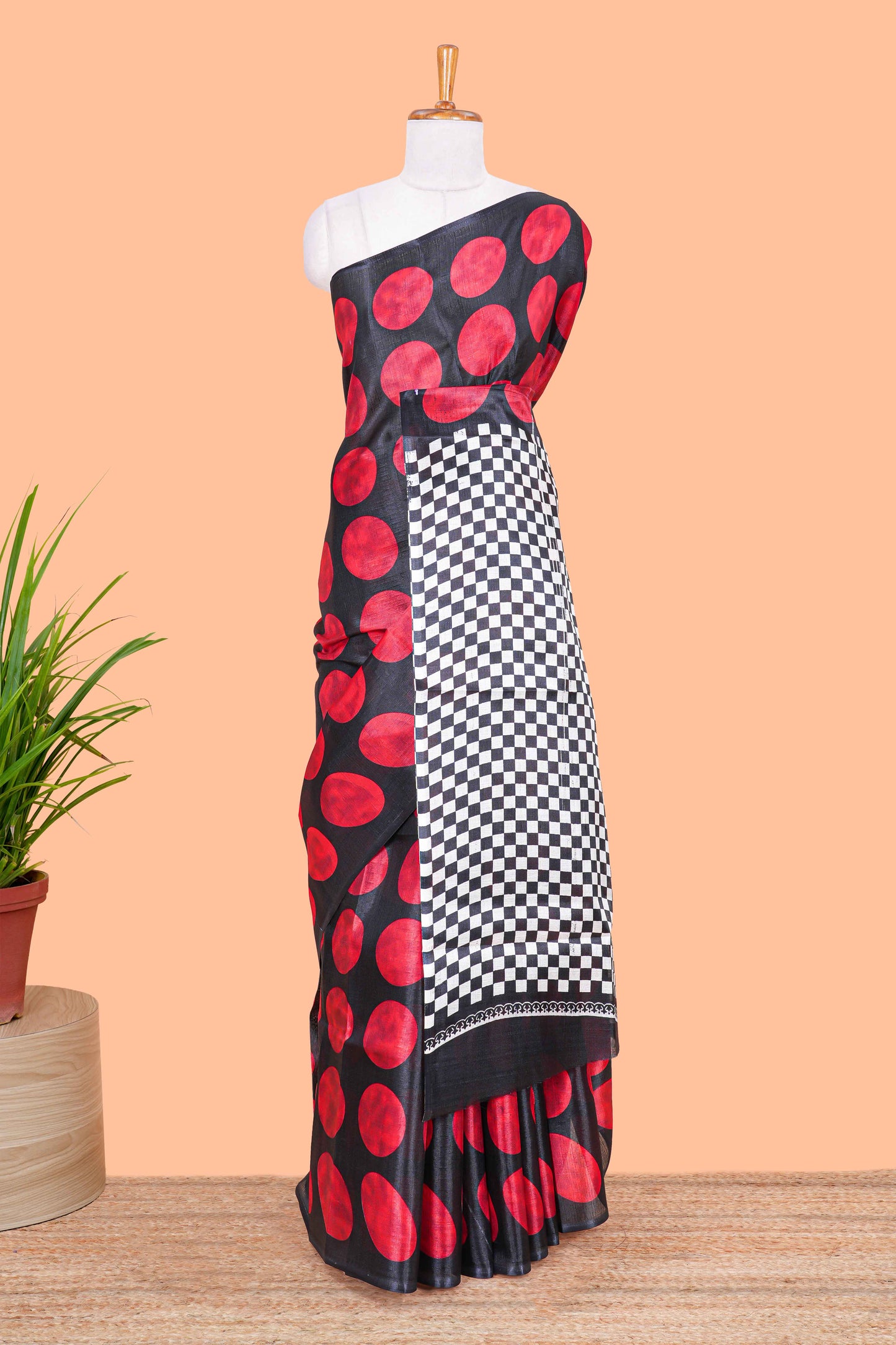 Borderless red khadi cotton saree with adire batik print and chess board pallu