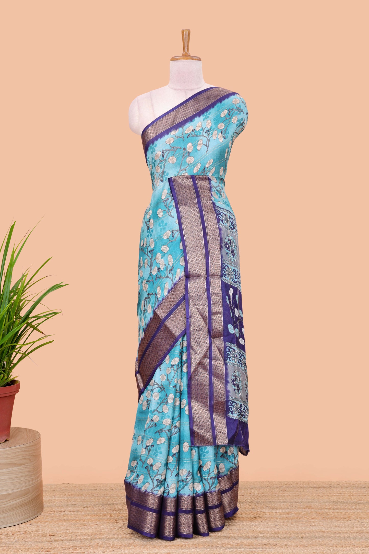 Blue moss chiffon floral printed saree with contrast jacquard border and jari line blouse