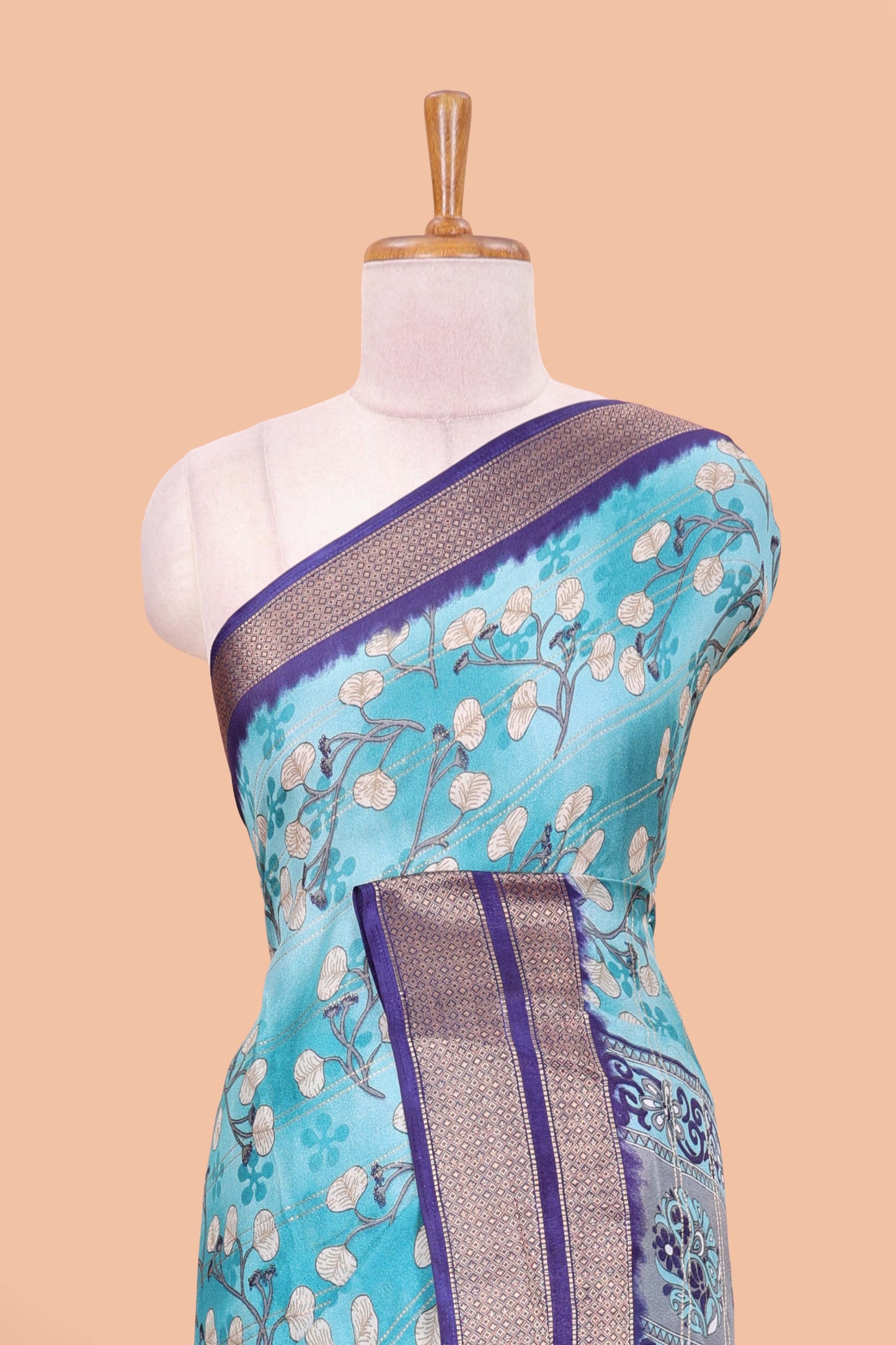 Blue moss chiffon floral printed saree with contrast jacquard border and jari line blouse