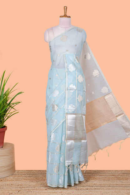 Blue floral zari butta linen tissue saree with zari border and contrast blouse