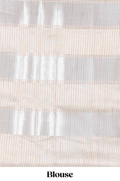 Blue floral zari butta linen tissue saree with zari border and contrast blouse