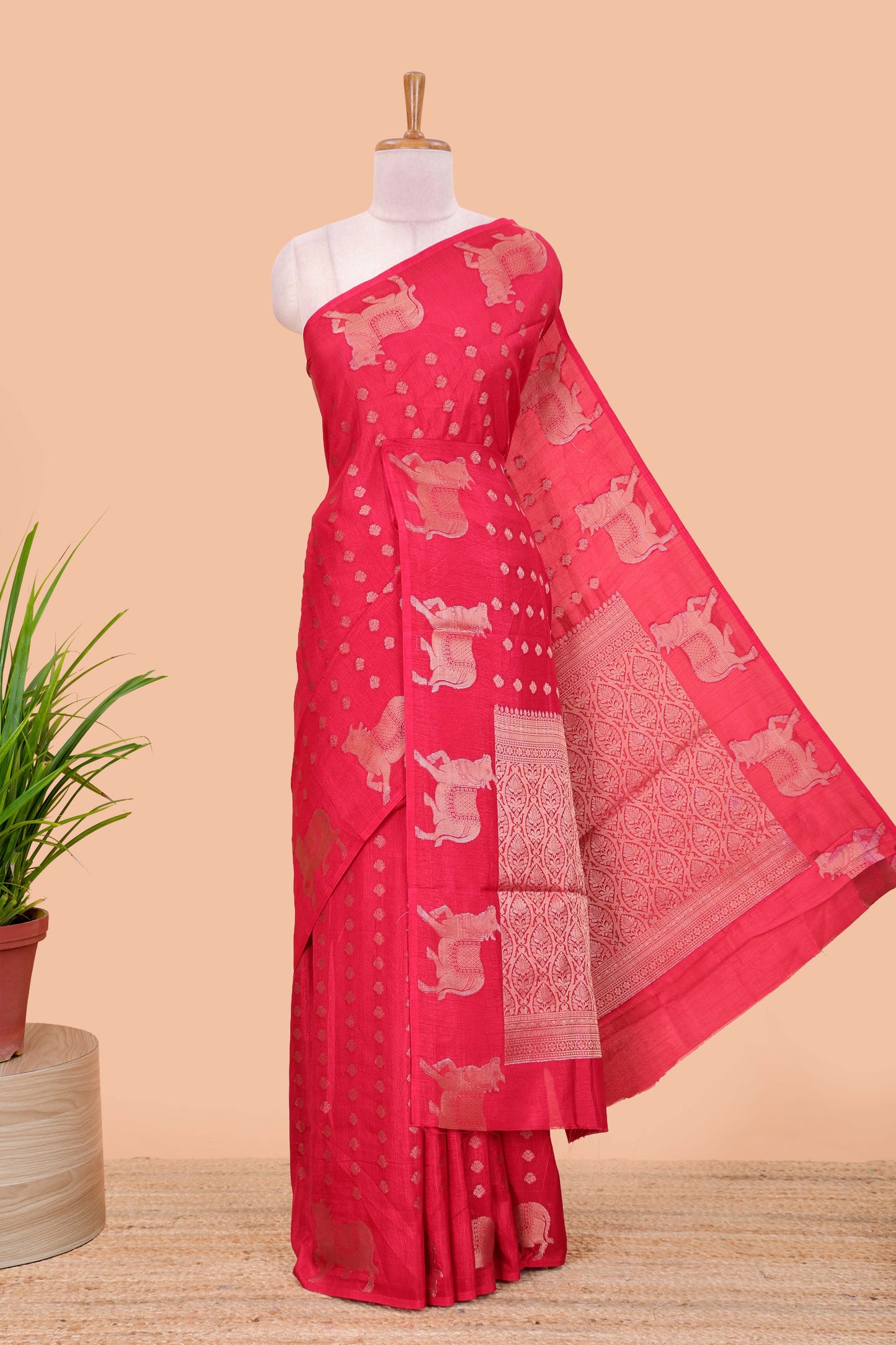 Red viscose dola silk saree with zari butta weave, pichwai motif border and contrast blouse