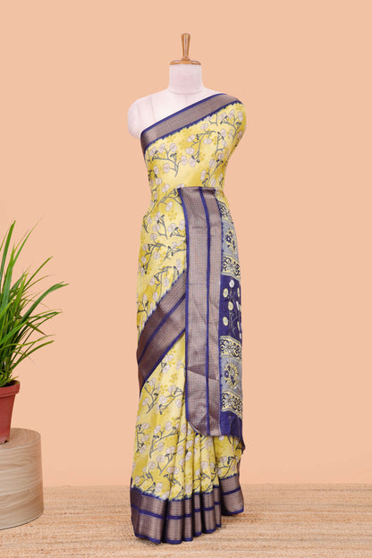 Lemon yellow moss chiffon floral printed saree with contrast jacquard border and jari line blouse