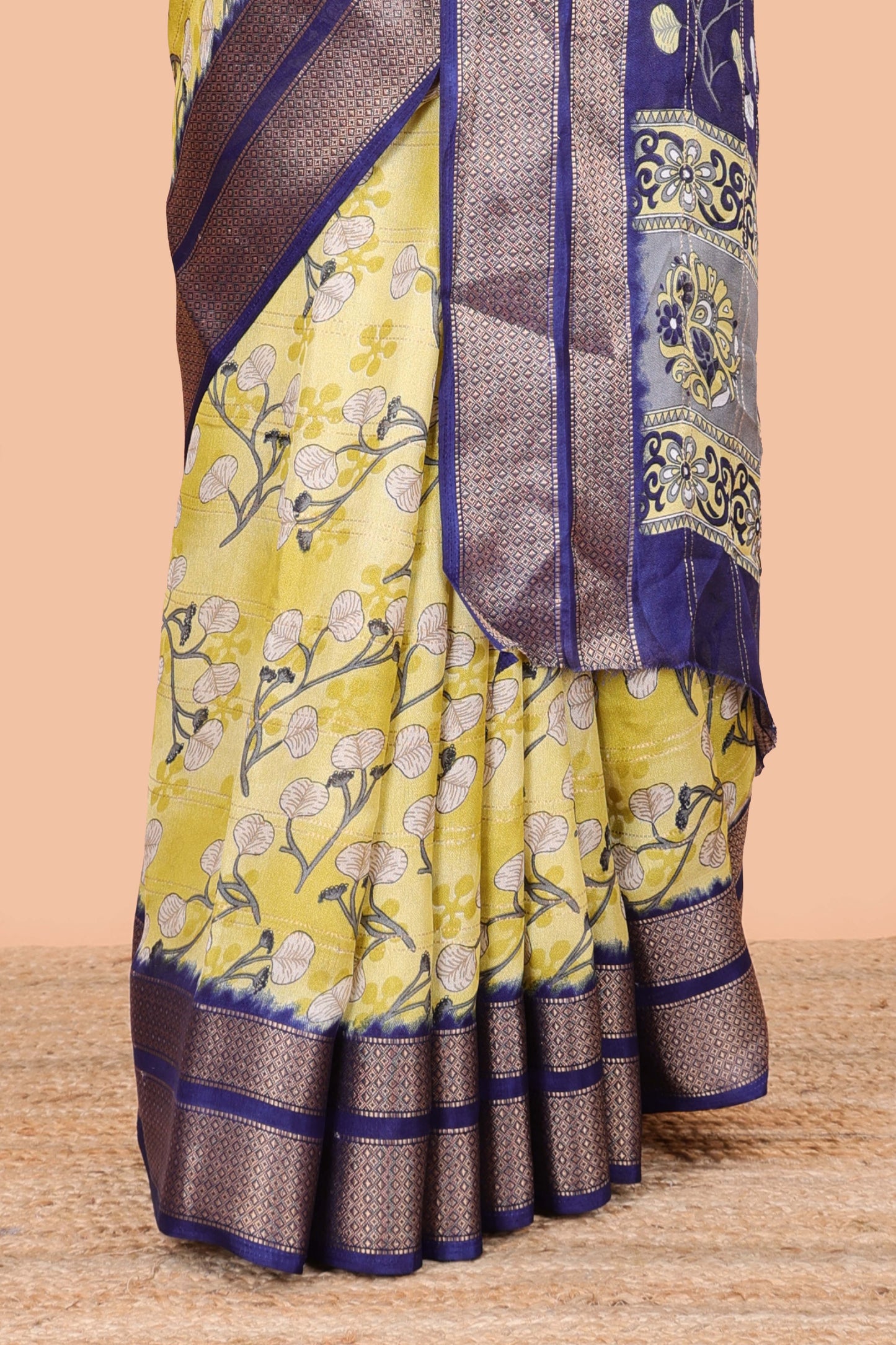 Lemon yellow moss chiffon floral printed saree with contrast jacquard border and jari line blouse