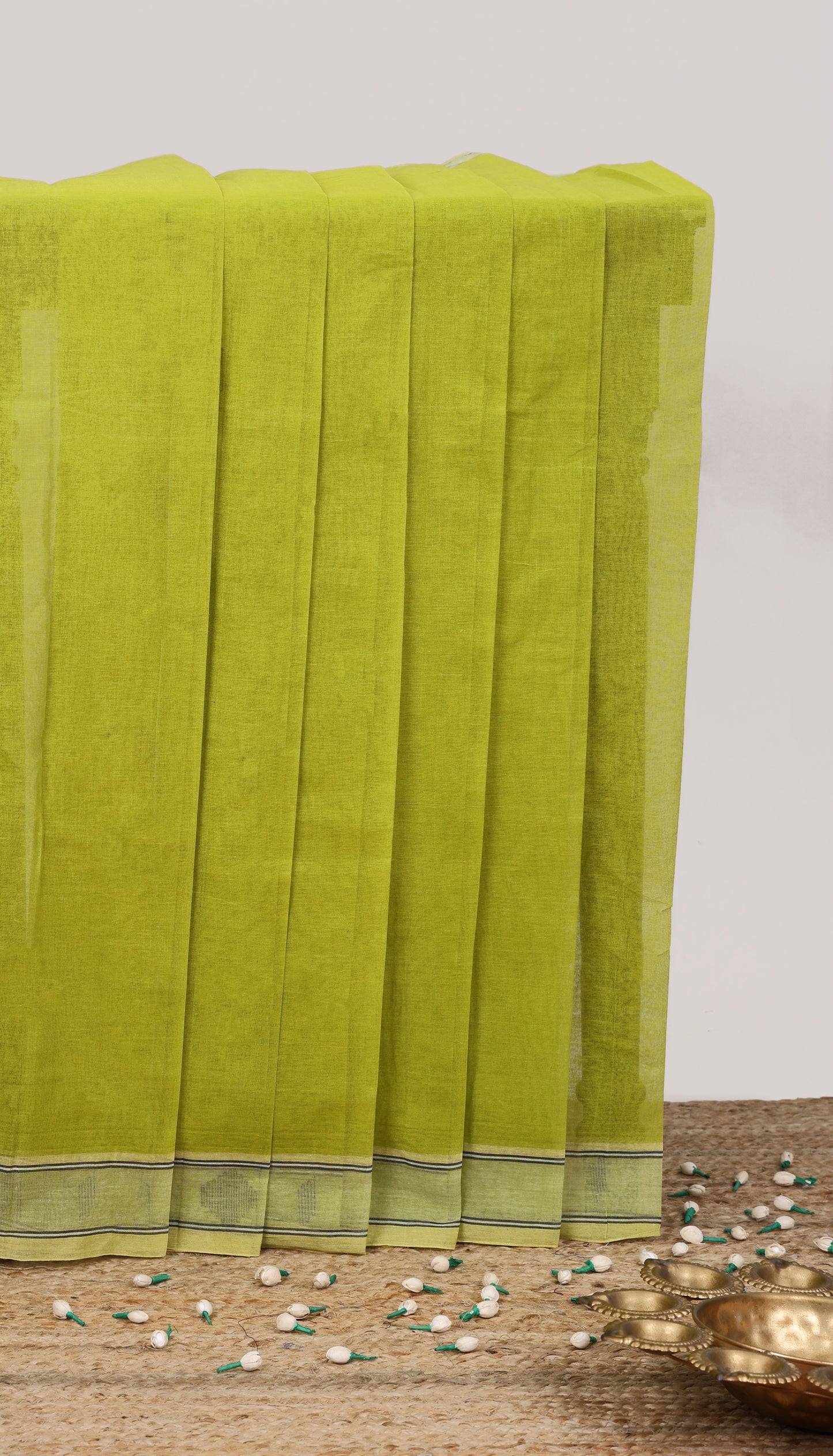 Green plain bengal cotton saree with self border and striped pallu