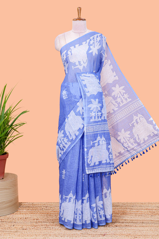 Blue linen cotton palm tree and elephant print saree with self border and matching printed blouse