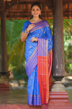 Blue checked peacock and unicorn motifs design semi soft silk saree with contrast border and blouse