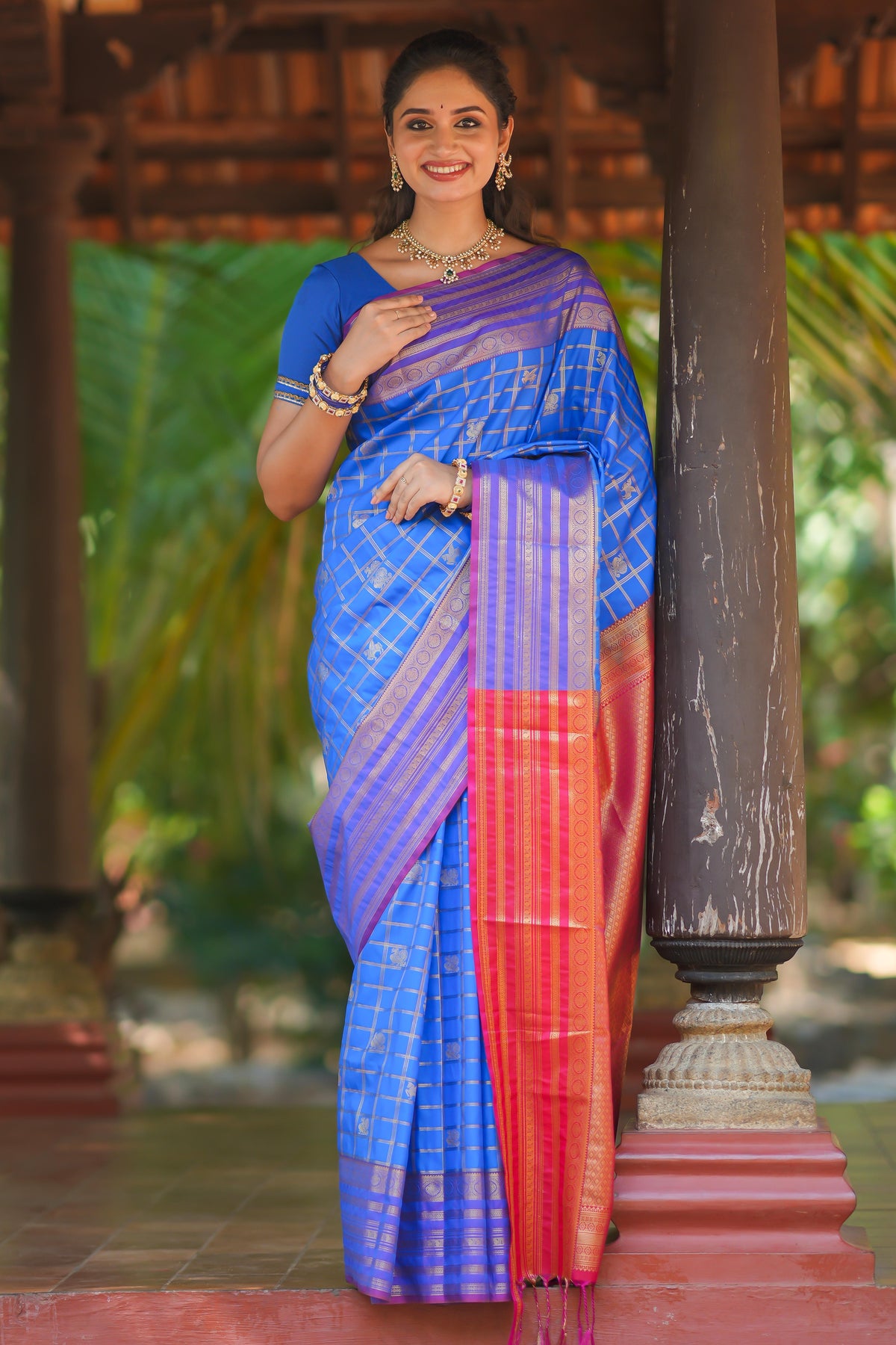 Blue checked peacock and unicorn motifs design semi soft silk saree with contrast border and blouse