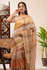 Brown Tones semi tussarall over saree Subtle Stripe and Checked pattern along with Tassels and Contrast Blouse