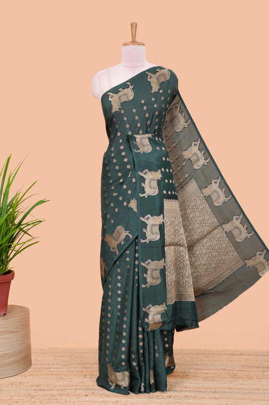Green viscose dola silk saree with zari butta weave, pichwai motif border and contrast blouse