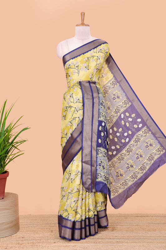 Lemon yellow moss chiffon floral printed saree with contrast jacquard border and jari line blouse