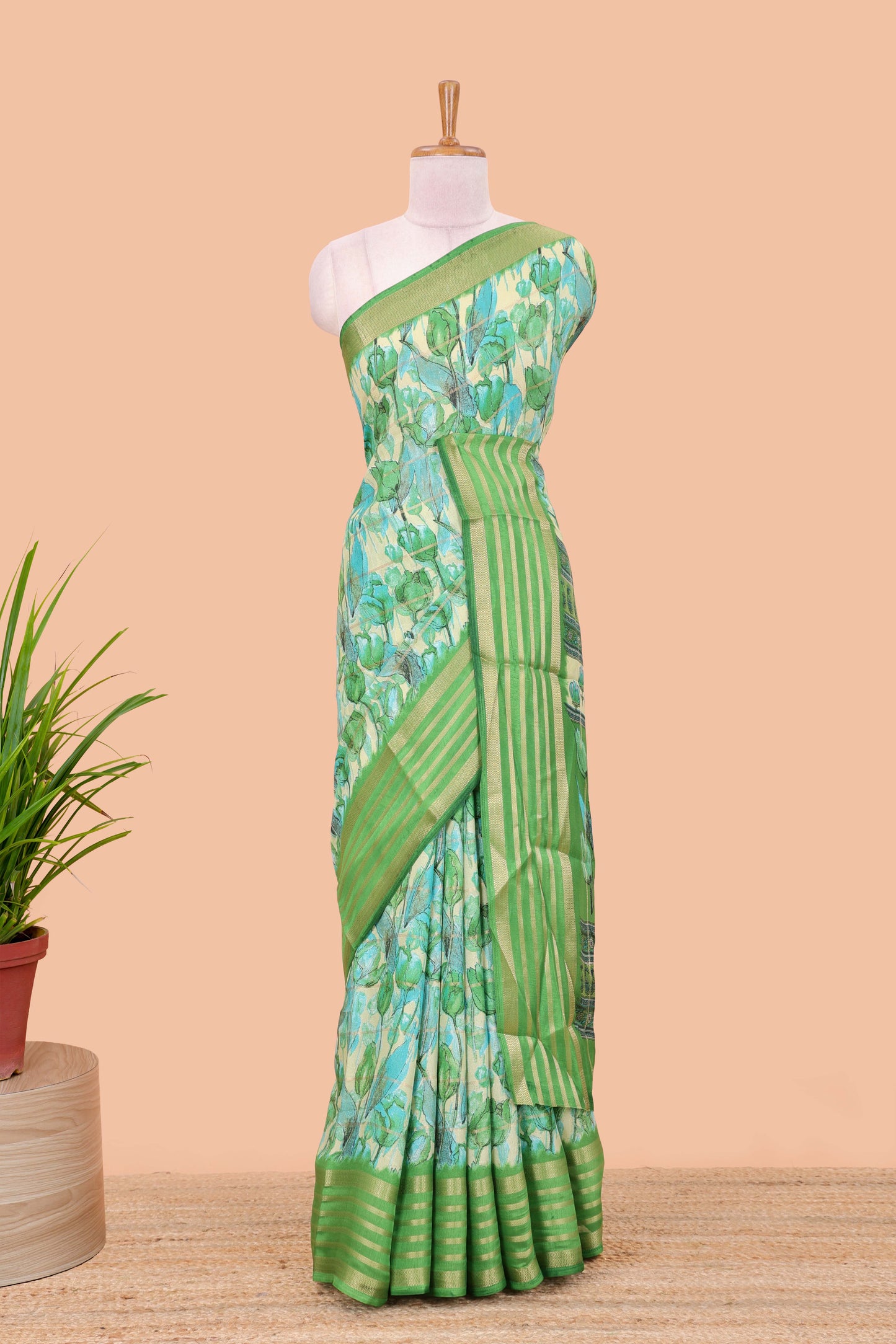 Green moss chiffon saree with striped floral print, contrast zari border and pallu
