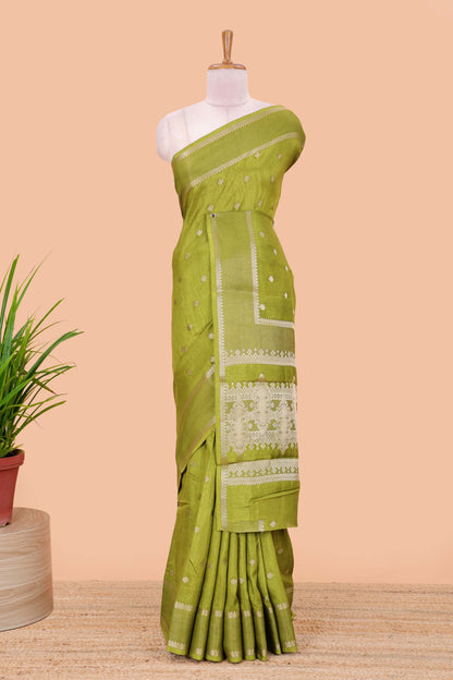 Green dola silk saree with all over zari butta, bendex zari border, rich zari pallu and contrast blouse