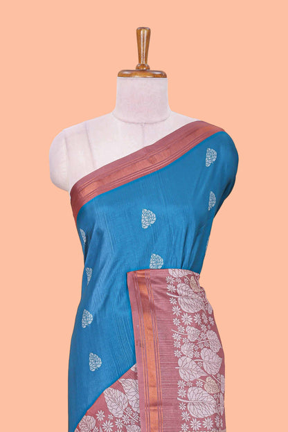 Blue leaf print semi tussar saree with contrast border and geometric pallu