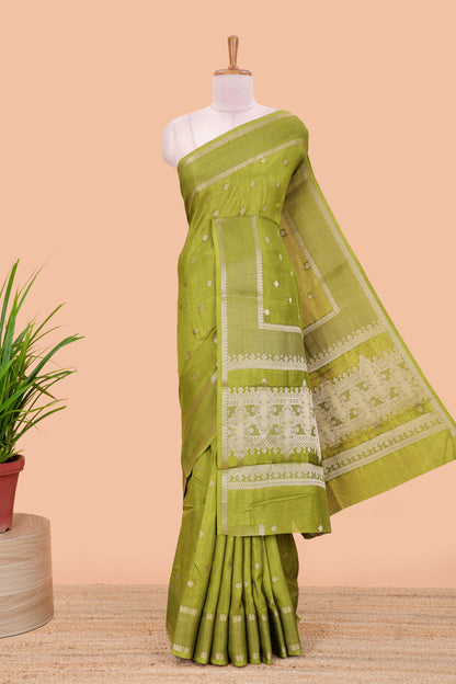 Green dola silk saree with all over zari butta, bendex zari border, rich zari pallu and contrast blouse