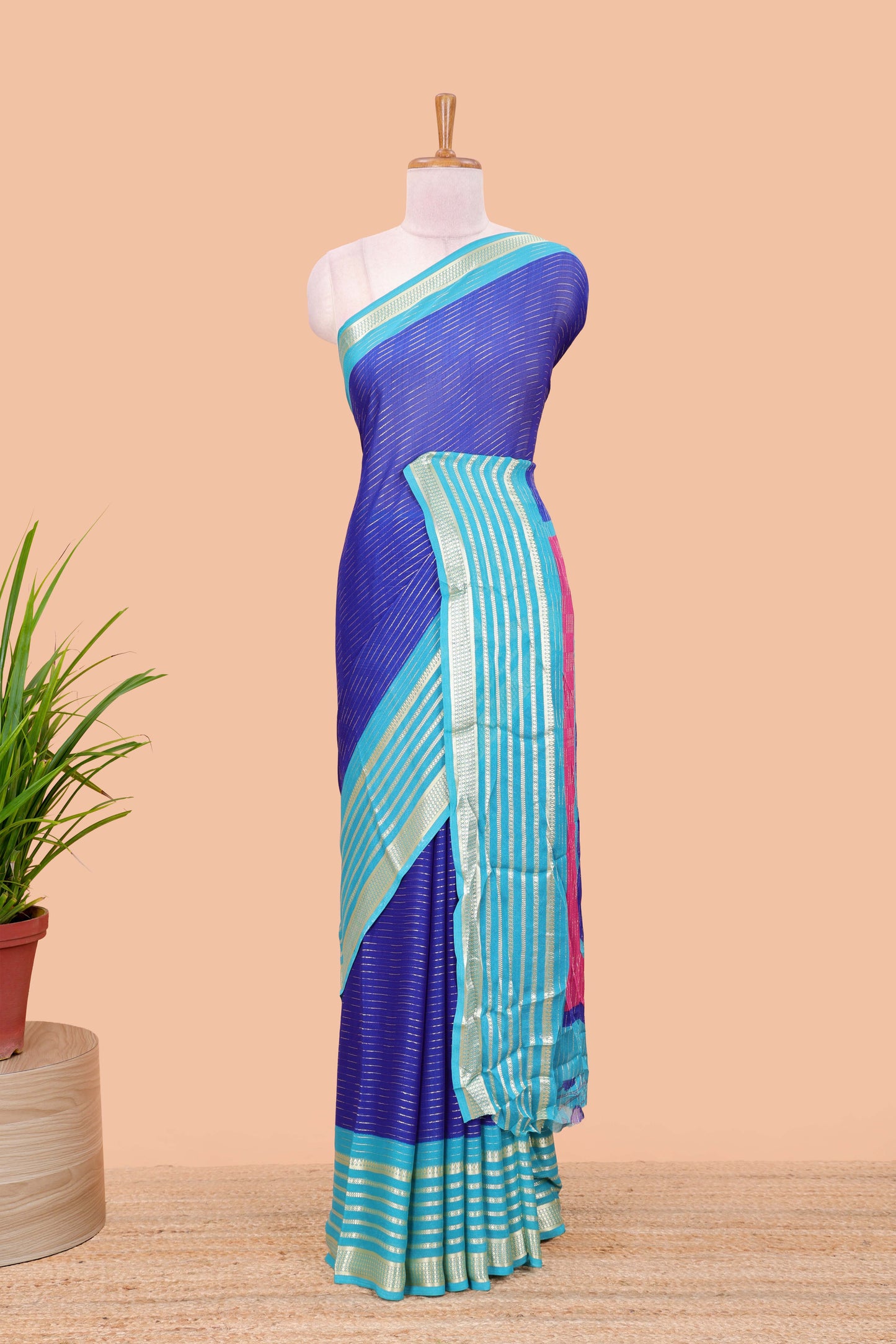 Blue moss chiffon saree with jari weaving, contrast border & printed blouse