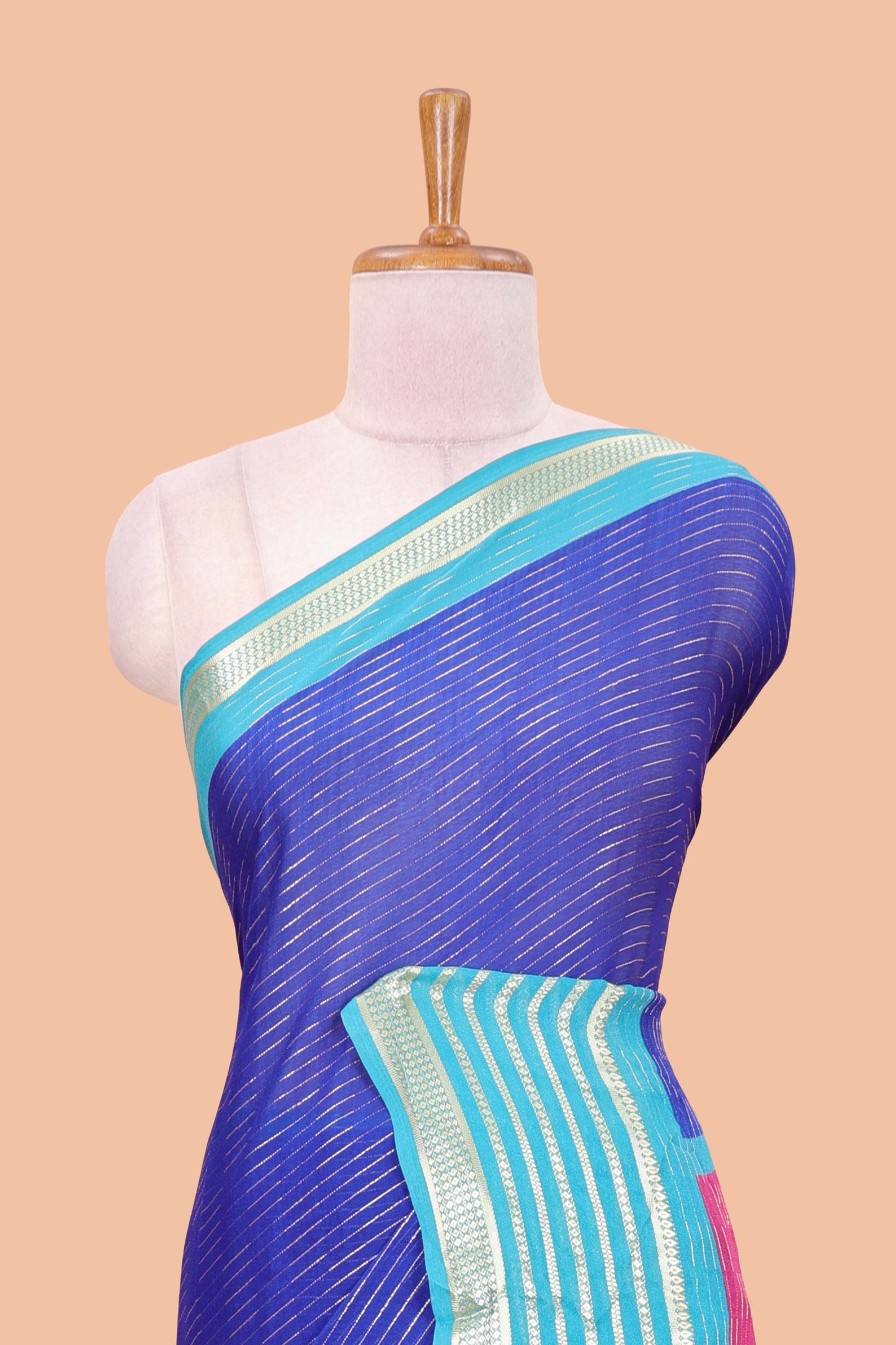 Blue moss chiffon saree with jari weaving, contrast border & printed blouse