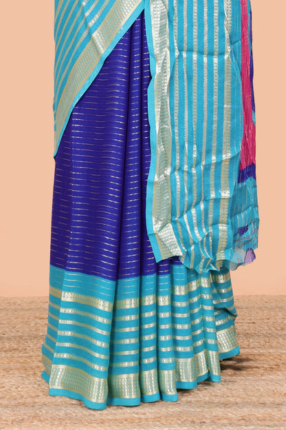 Blue moss chiffon saree with jari weaving, contrast border & printed blouse
