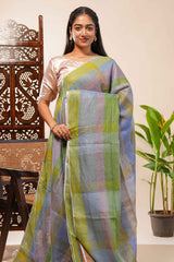 Green done Tones semi tussarall over saree Subtle Stripe and Checked pattern along with Tassels and Contrast Blouse