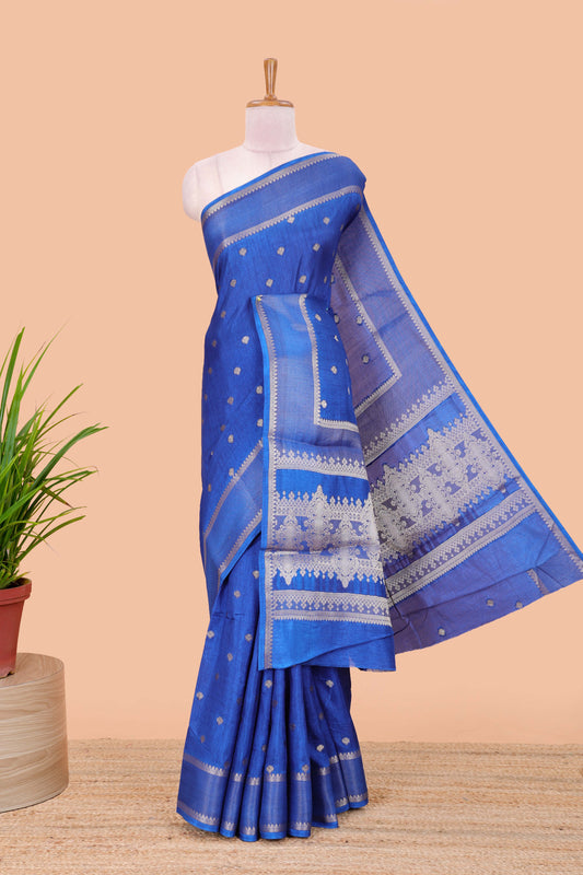 Blue dola silk saree with all over zari butta, bendex zari border, rich zari pallu and contrast blouse