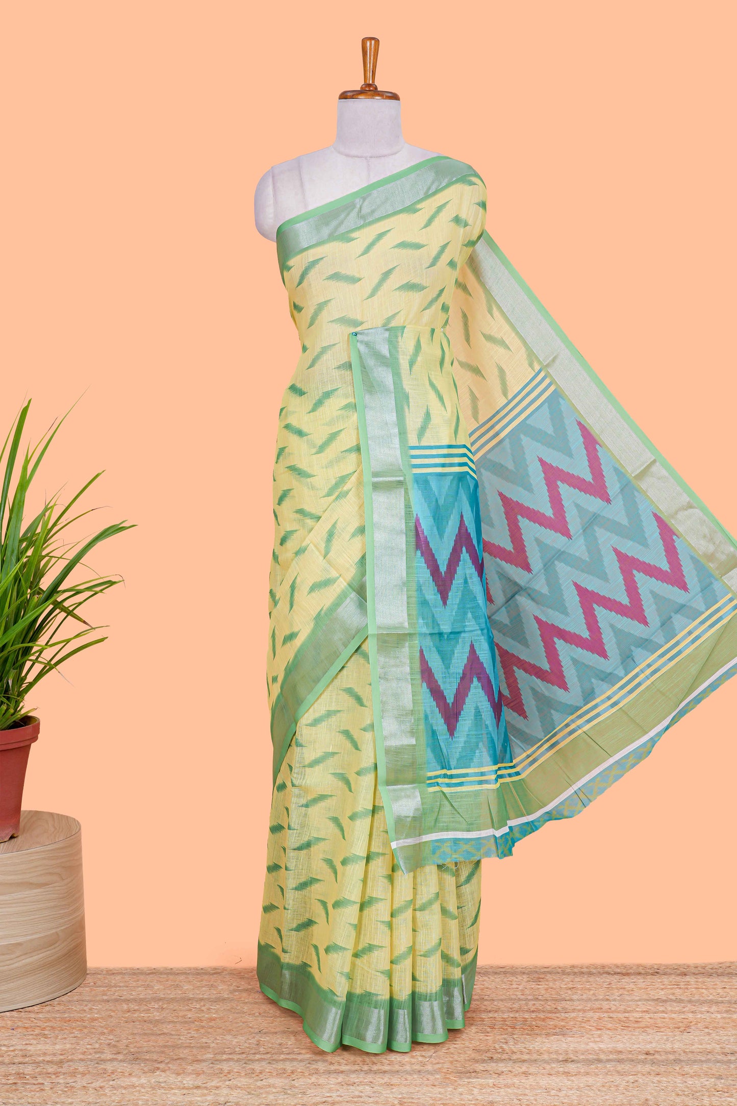 Green Ikkat style linen cotton saree with contrast border and pallu