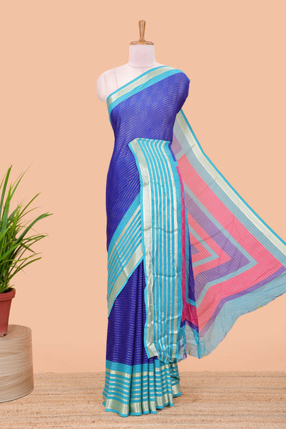 Blue moss chiffon saree with jari weaving, contrast border & printed blouse