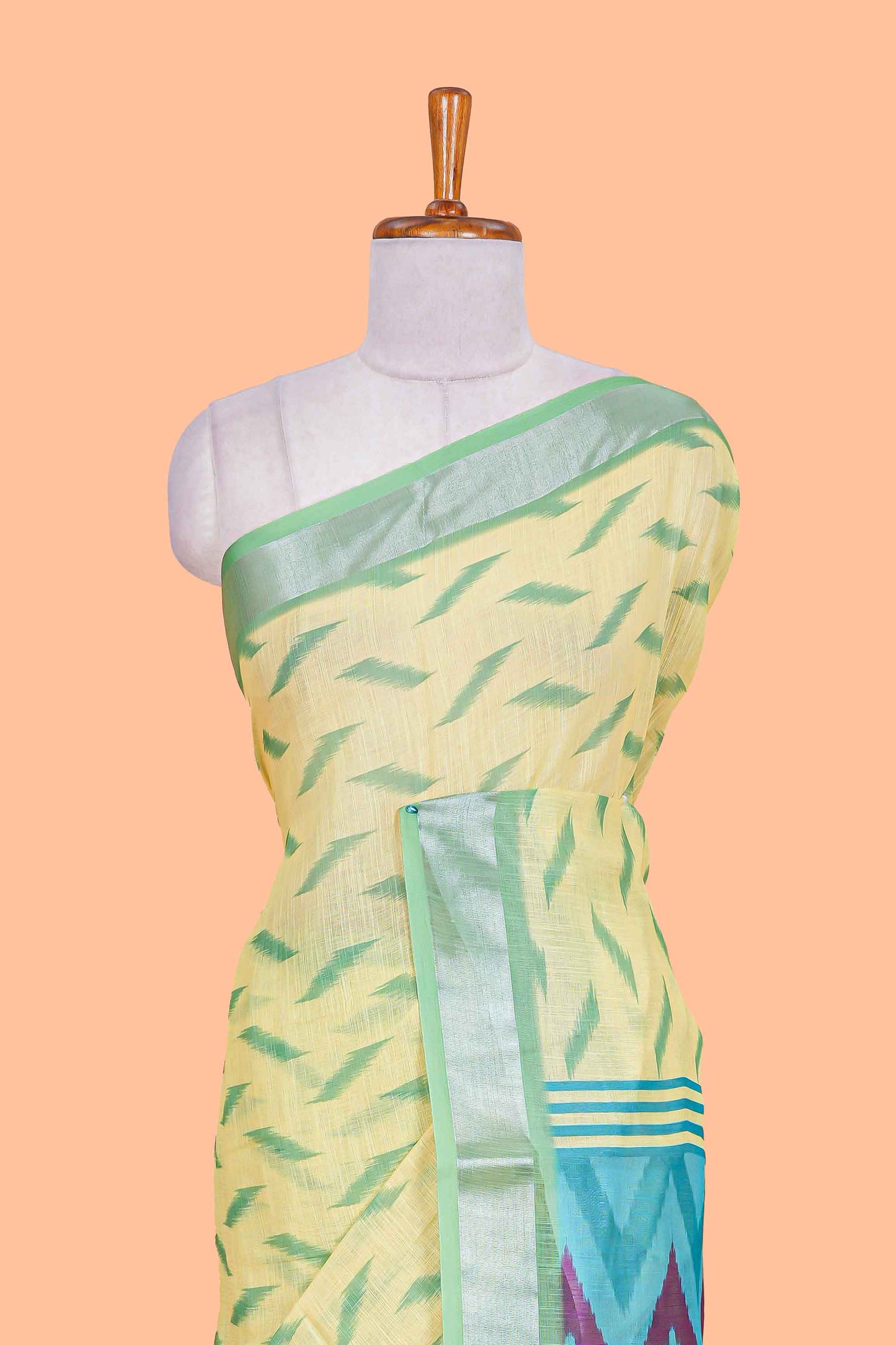 Green Ikkat style linen cotton saree with contrast border and pallu