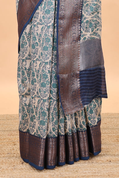 Cream paisley print chanderi cotton saree with contrast zari border and pallu