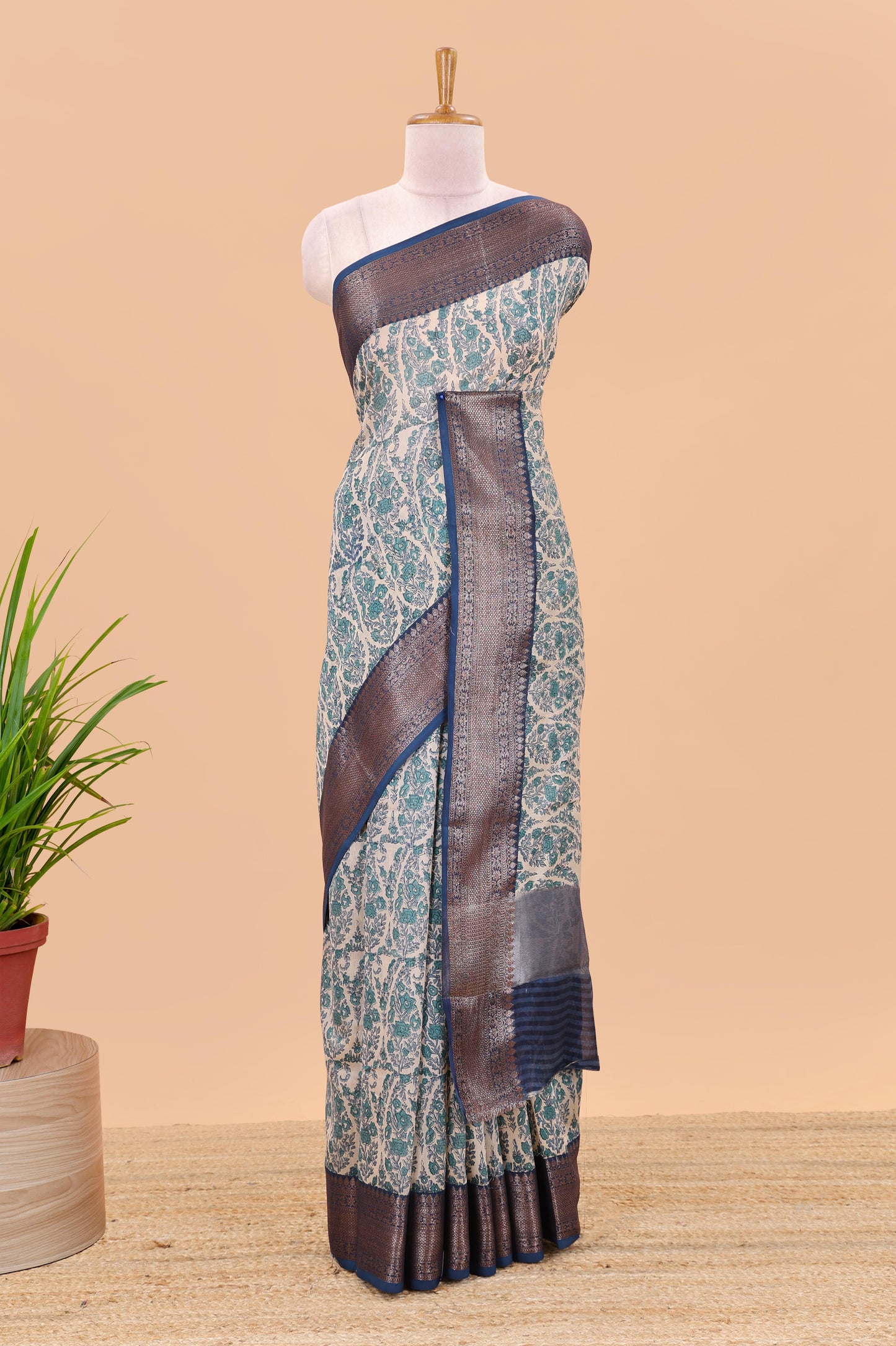 Cream paisley print chanderi cotton saree with contrast zari border and pallu