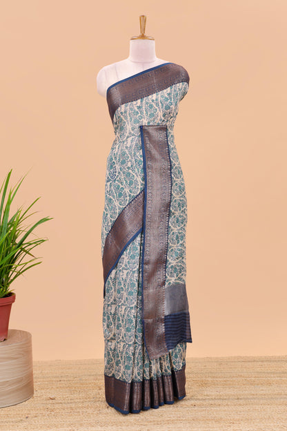 Cream paisley print chanderi cotton saree with contrast zari border and pallu