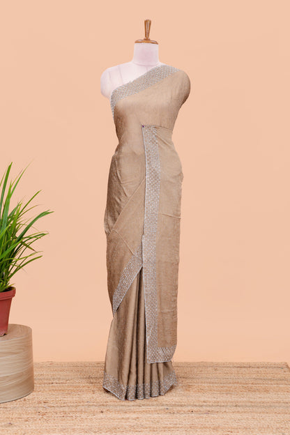 Gold chiffon georgette crush saree with all-over stone work, stone & beads border, and short stone work pallu with contrast embroidery blouse