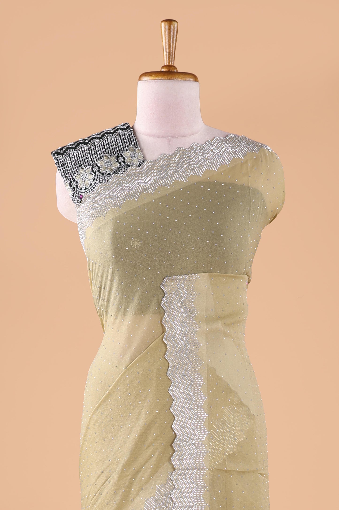 Green designer georgette space silk saree with heavy stone & beads work, short pallu and contrast sequin embroidered blouse