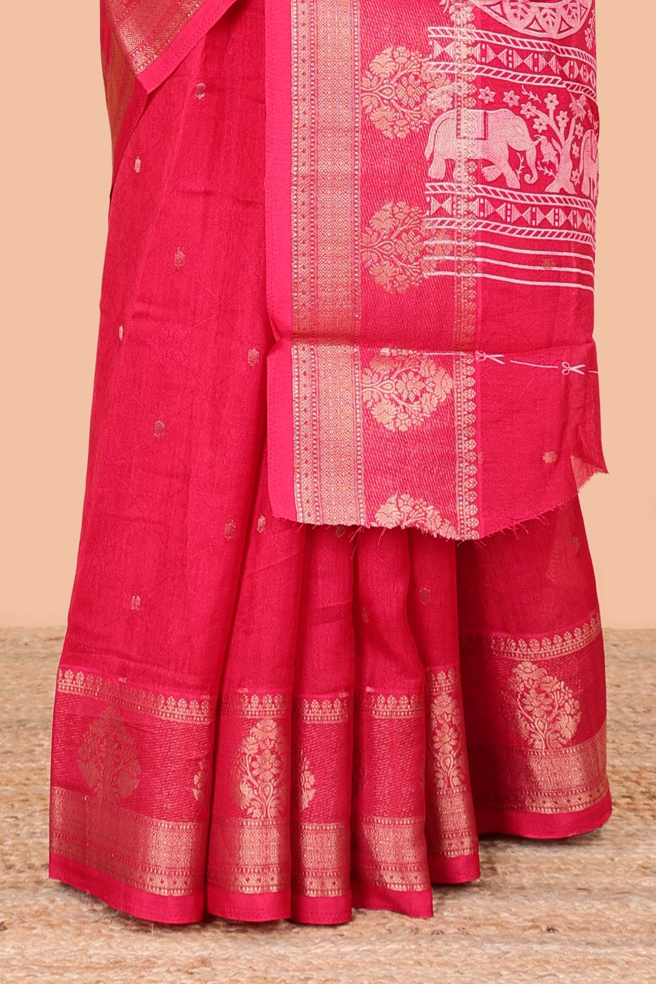 Red viscose dola silk saree with all-over zari butta, elephant motif pallu & contrast blouse