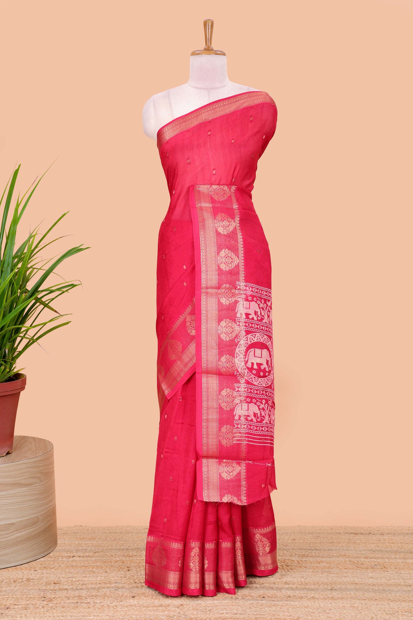 Red viscose dola silk saree with all-over zari butta, elephant motif pallu & contrast blouse