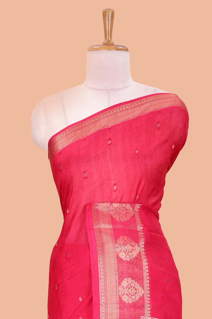 Red viscose dola silk saree with all-over zari butta, elephant motif pallu & contrast blouse