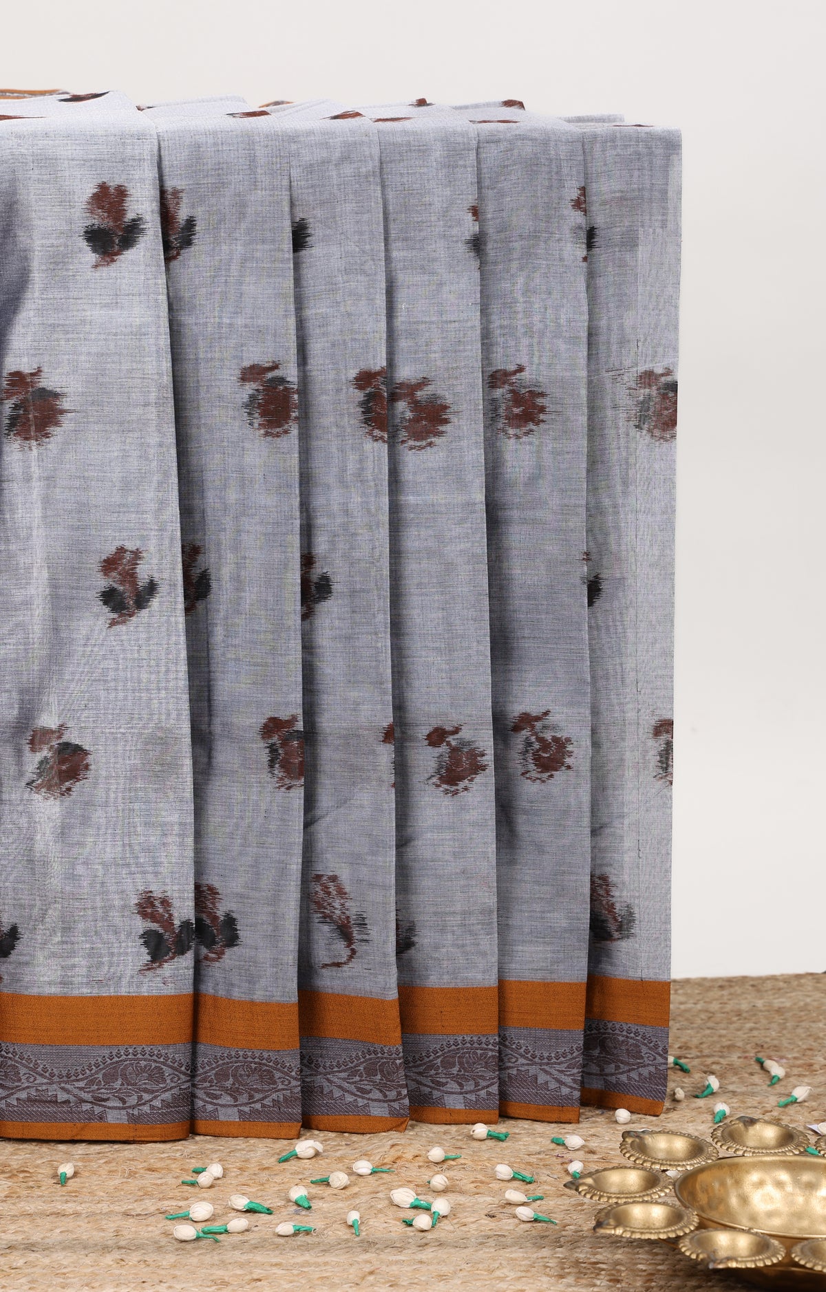 Grey floral butta bengal cotton saree with contrast border and pallu