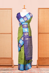 Green Art Silk Saree Body Detailing Zari Butta And Border Are Highlight Contrast Color With Intricate Zari Woven Elephant, Peacock Motifs With Golden Zari WeavingPallu
