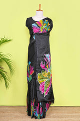 Black south cotton Saree With Multi Color Orchid Printed Across The Body Along With White Dotted Blouse