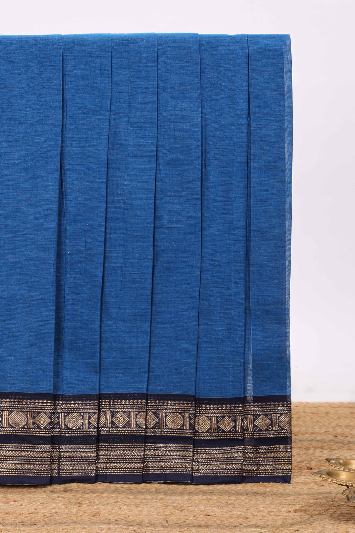 Blue plain chettinad cotton saree with contrast zari border and matching blouse