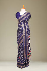 Navy Blue Dola Silk Saree Jaali Design ,Pink Lotus Motifs Across The Body With Gold Zari Bentex BorderPichwai Design Pallu Along With Blouse