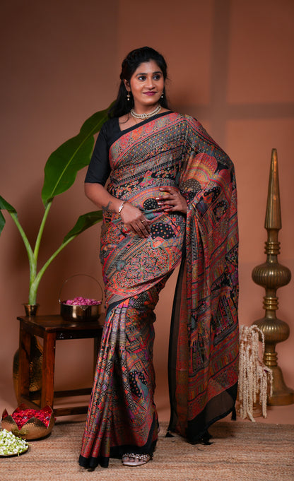 Black mughal style foil print georgette saree with self border and matching floral printed blouse