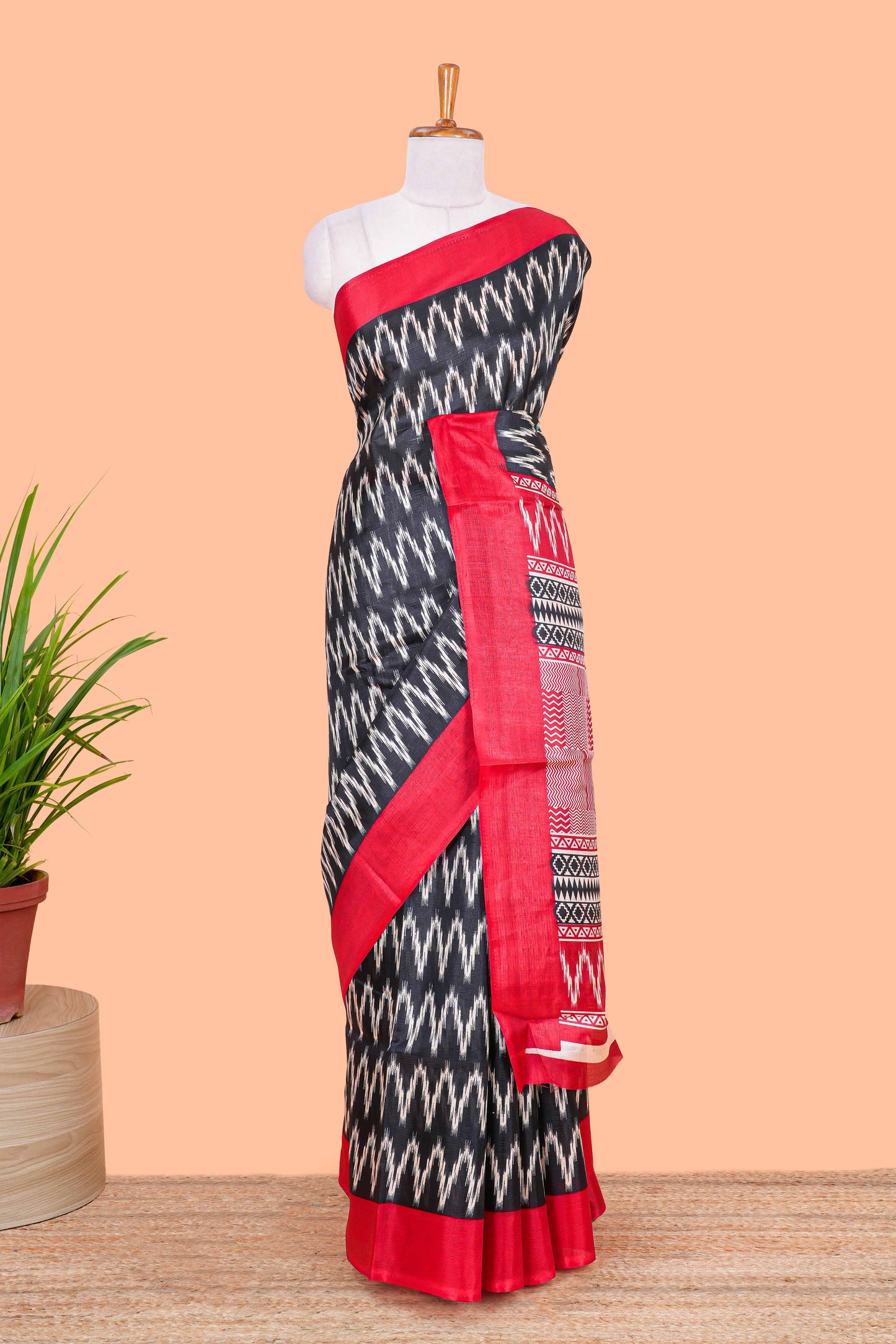 Black ikkat style chevron print south cotton saree with contrast border and blouse