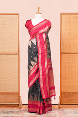 Black Semi Art Silk Saree Delicate Golden Zari Motifs Along With Thalampoo Zari Woven Across The BodyZari Weaving And Contrast Pallu