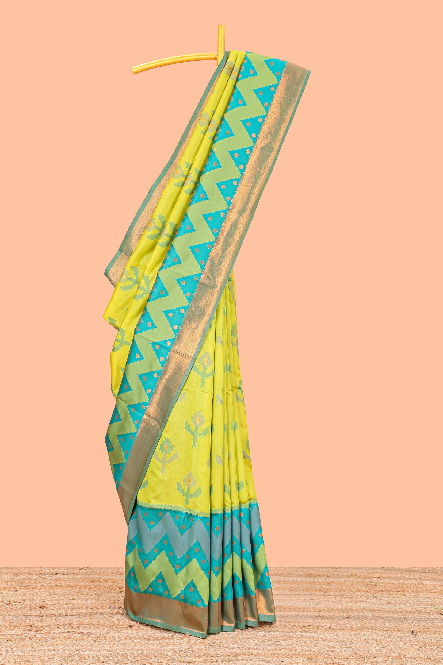 Parrot Green Semi Soft Silk Saree Body All Over Ikkat Pochampally Thread Weaving and Chevron Pattern Border With Ikkat Rich Pallu