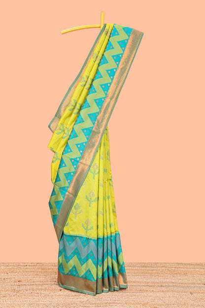 Parrot Green Semi Soft Silk Saree Body All Over Ikkat Pochampally Thread Weaving and Chevron Pattern Border With Ikkat Rich Pallu